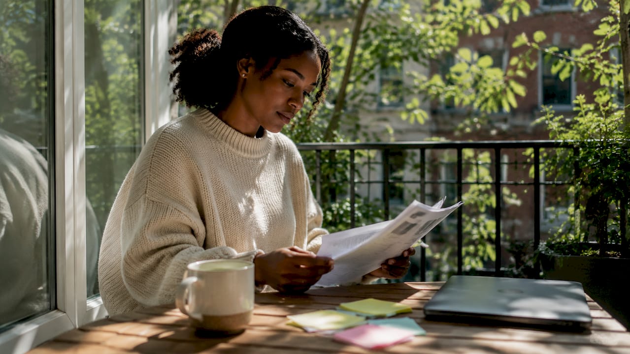 Person studying ethical hair standards documents