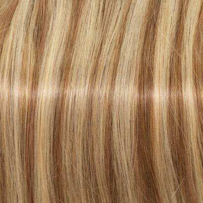 Sandy blonde hair colour close-up — warm beige blonde with golden highlights