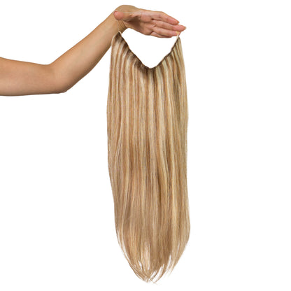 Sandy Blonde Remy human hair invisible wire extension held up showing the transparent wire